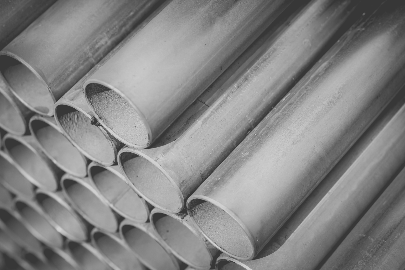 Close - up Stack of construction metal pipes